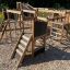 Wooden Space Station Nature castle with slide for children.