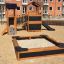 a black sandpit on the playground
