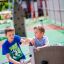 boys playing on the compact climbing frame