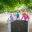 Children climbing on the Hidden corner steel structure in a playground.