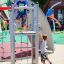 Children playing on Whale - AZTEC steel structure in a park