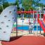 Kids playing on Whale - AZTEC steel structure playground equipment.
