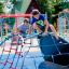 boys playing on the climbing metal frame