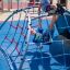 boys playing on the mini climbing frame