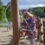 Vesuvius steel structure playground equipment with a child climbing a rope ladder