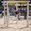 Child climbing on the Yellowstone wooden playhouse at the playground.
