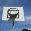 Basket outdoor basketball hoop with net on a sunny day