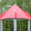 Ladybird playhouse with slide, close-up of red canopy