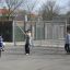 Outdoor playground equipment with a football goal.