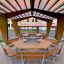 School Table & Bench under wooden pergola in playground.