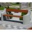 Concrete and wood bench Dona in a landscaped park.