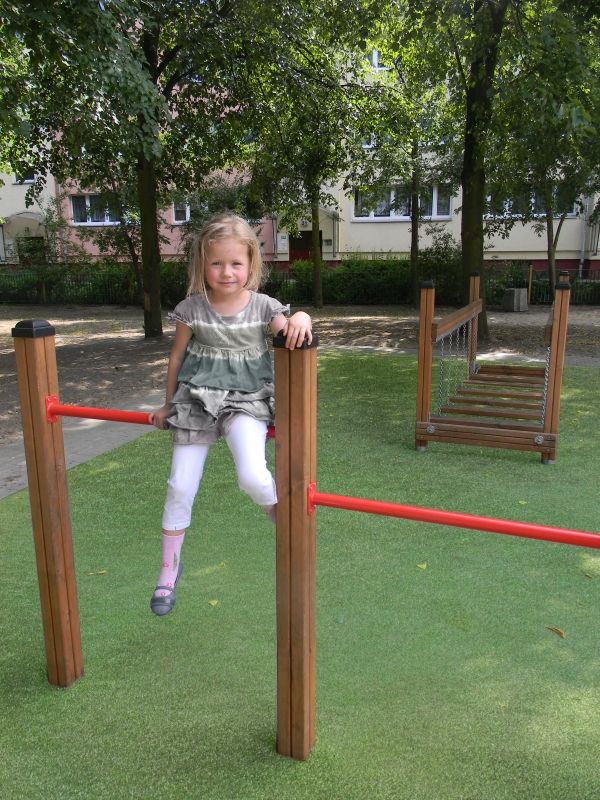 Shock Absorbing Pad 35mm with Artificial Grass on a playground.