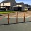 Outdoor wooden balance and climbing structure Triple Somersault Nature in a modern residential playg
