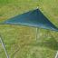 Sun Shade Triangle 3x3x3 Atlantis (Metal), green triangle sunshade installed on grassy area.