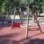 Playground with Rubber Tiles 45 and swing set.