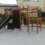 Playground equipment made of wood with Wetpour 100 surface