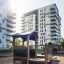 a black play house on the playground in the residential area