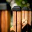 Close-up of the wooden posts of the Tower Nature wooden playhouse with slide.