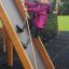Child climbing on the Mastodon castle with slide playground equipment.