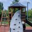 Six Angle Aztec playground set with climbing wall and slide