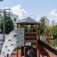 Six Angle Aztec playground structure with climbing wall and slide