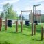 Outdoor playground equipment with wooden obstacles and climbing structures named Single Somersault N