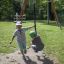 Two boys playing on the Medium Cableway with platform in a park.
