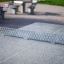 Concrete table tennis, free-standing table in a park setting.
