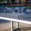 Concrete table tennis, free-standing ping pong table in a park.