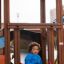 Child using the Jubilee Unit castle with slide.
