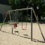 Swing Metal Frame (double swing) in a sandy playground.
