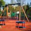 Alt: Swing seat: Baby seat on a playground.