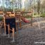 Wooden Panther playhouse for children in a playground.