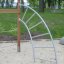 Panther wooden playhouse outdoor climbing structure in a park setting