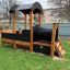 Wooden Locomotive Nature train playhouse in a park