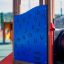 Outdoor playground equipment Sigma with blue alphabet learning board.