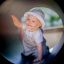 Child playing inside Smart playhouse with slide