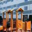 Smart playhouse with slide in residential area.