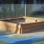 Wooden Sandpit for children on a playground.