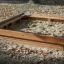 wooden sandpit installed on the sand