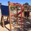 Wooden playground structure with climbing frame and slide, Zebra single slide.
