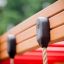 Playground equipment close-up, featuring ropes and wooden bars from Zebra single slide.