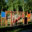 Zebra single slide playground with wooden climbing frames and red slide