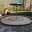 an outdoor play table installed in the sandpit