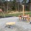 Playground equipment Daisy by Lars Laj in outdoor park.
