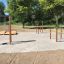 Outdoor fitness area with Stretching bar and workout stations