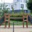 Wooden Bridge playground climber for kids in a modern housing estate.