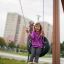 Girl swinging on Single Swing with Tower single slide in a park