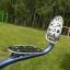 Outdoor fitness equipment Set 8 installed on a grassy area.