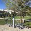 Outdoor Set 8 fitness equipment in a park setting.